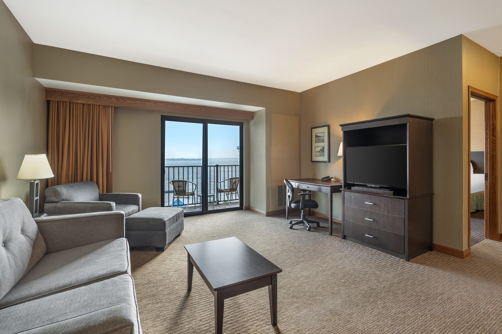 a room with a television and couches