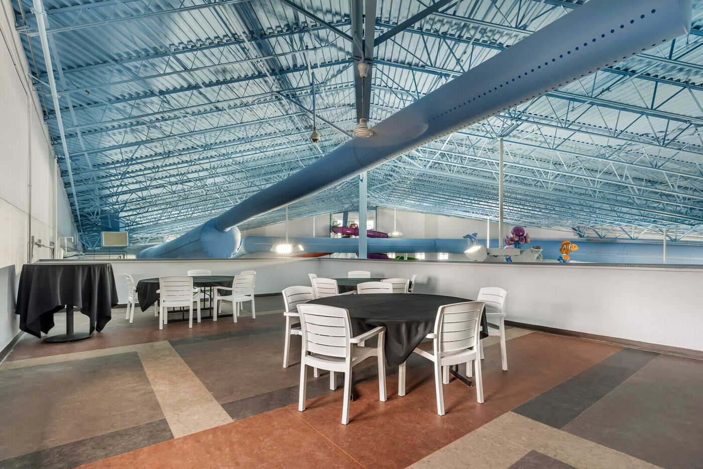 a room with a table and chairs