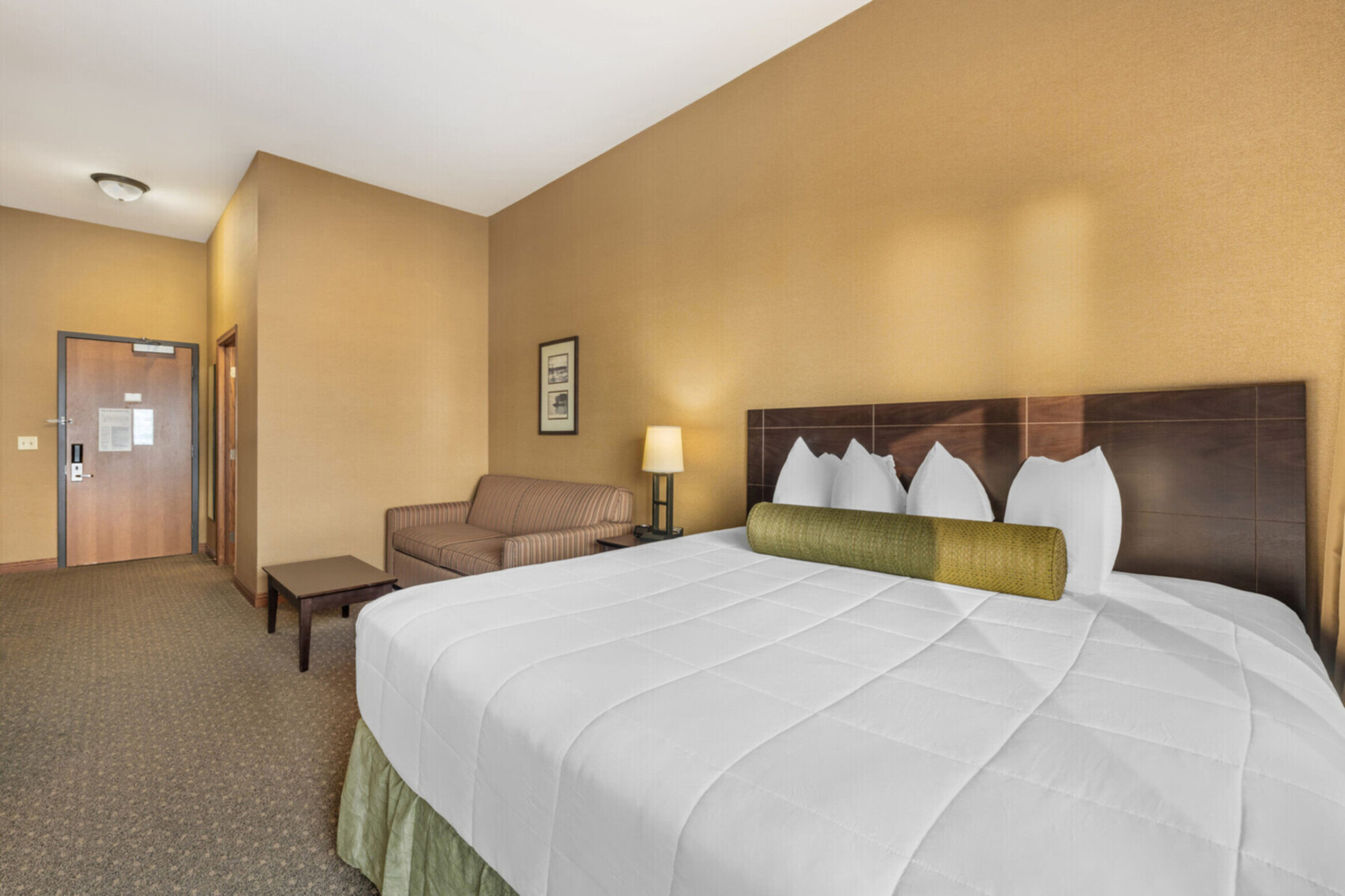 a room with a bed and a chair